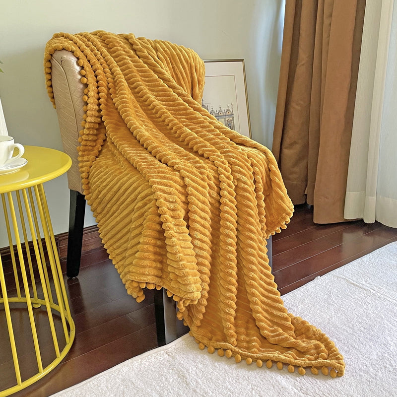 DISSA Flannel Fleece Blanket Soft Large Throw Blanket with Pompom Fringe Lightweight Cozy Plush Blanket Fit Sofa Bed(Mustard Yellow,51x63